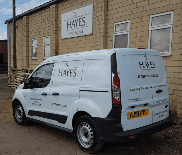 simple van graphics with logo and text on a small van
